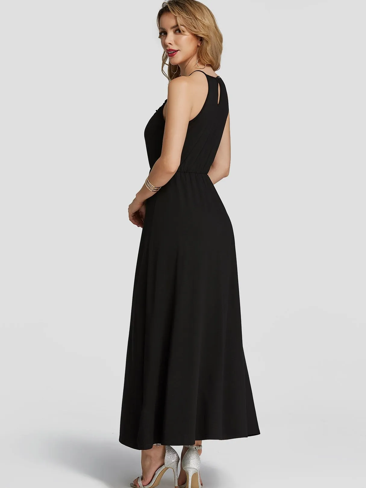 Wholesale Black Crew Neck Sleeveless Plain Hollow Spaghetti Strap Ruffle Hem Maxi Dresses